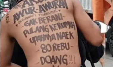 Viral, Buruh Bekasi Pampang Tulisan Di Punggung Keliling Kawasan